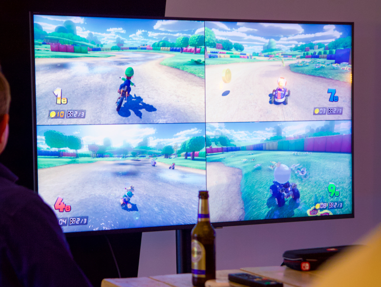 Mariokart spelen op de borrel van Development Day 3